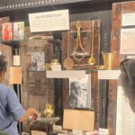 Visitors closely examining the installation by Camerawaali, at the Museo Camera, Gurgaon