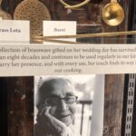close crop of the Brass Lota Jharni labels with the wedding brassware placard and portrait